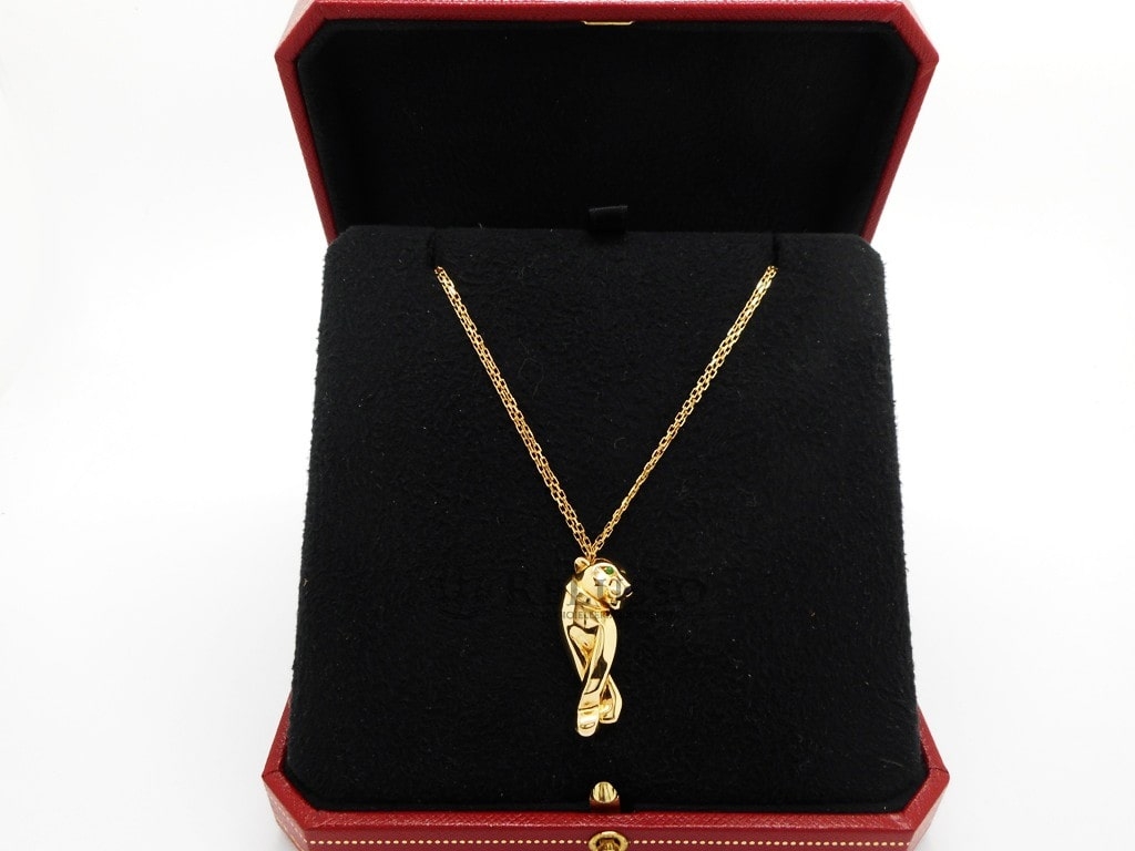 Collier Panthère de Cartier in oro giallo, tsavorite e onice foto5