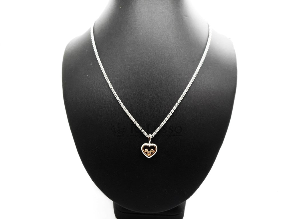 Collana con pendente Chopard collezione Happy Diamonds Icon in oro bianco e giallo foto4