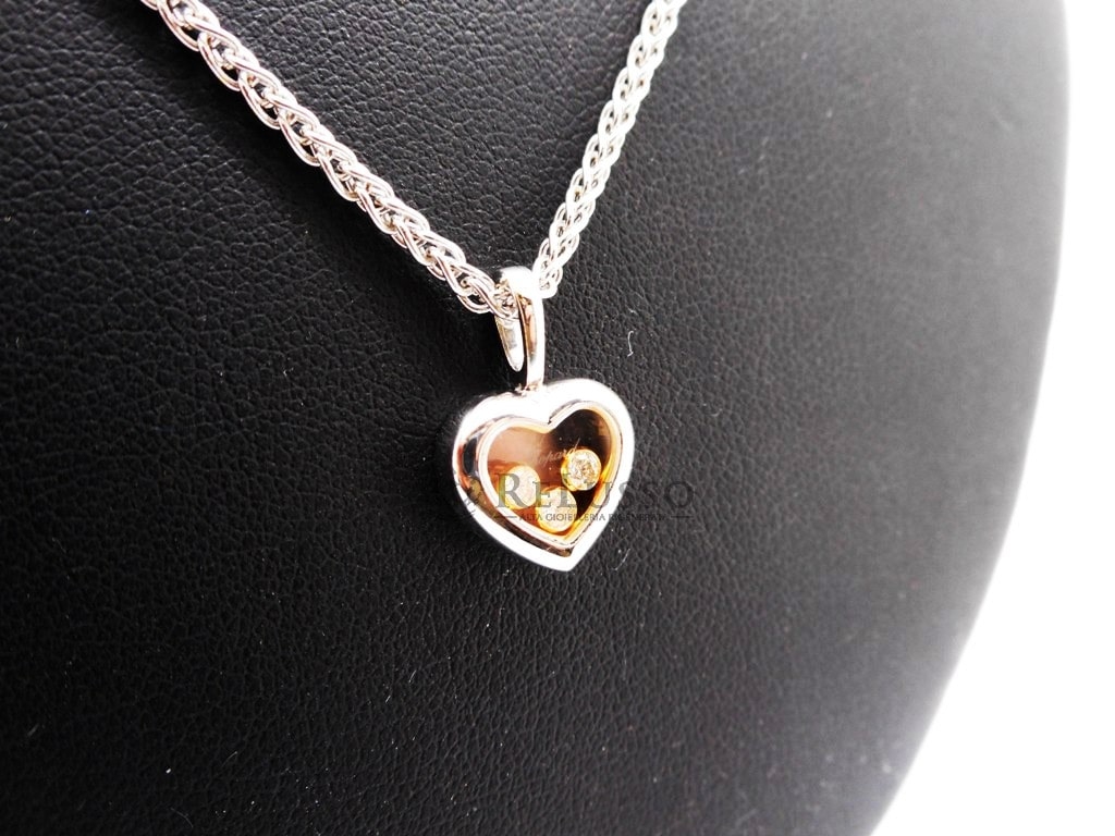Collana con pendente Chopard collezione Happy Diamonds Icon in oro bianco e giallo foto6