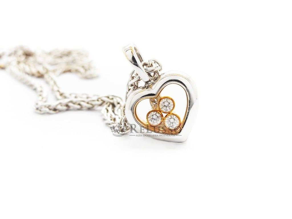 Collana con pendente Chopard collezione Happy Diamonds Icon in oro bianco e giallo foto8