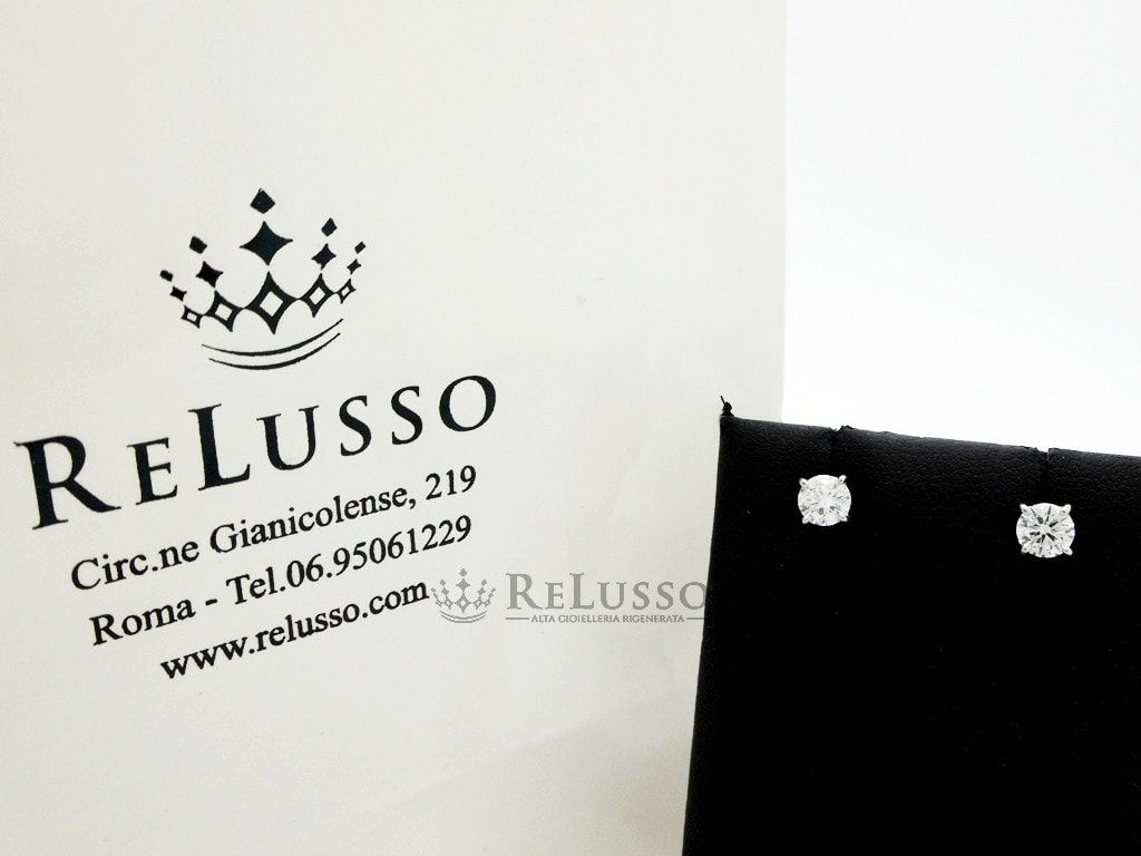 Orecchini punto luce in oro bianco da 0,65ct H color FOTO1