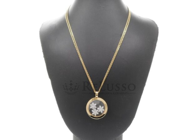 Collana con pendente Chopard collezione Happy Diamonds Snowflakes in oro giallo e bianco foto1