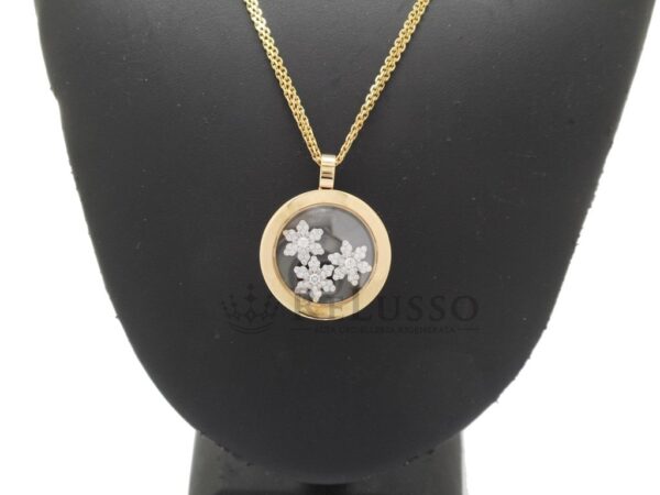 Collana con pendente Chopard collezione Happy Diamonds Snowflakes in oro giallo e bianco foto3