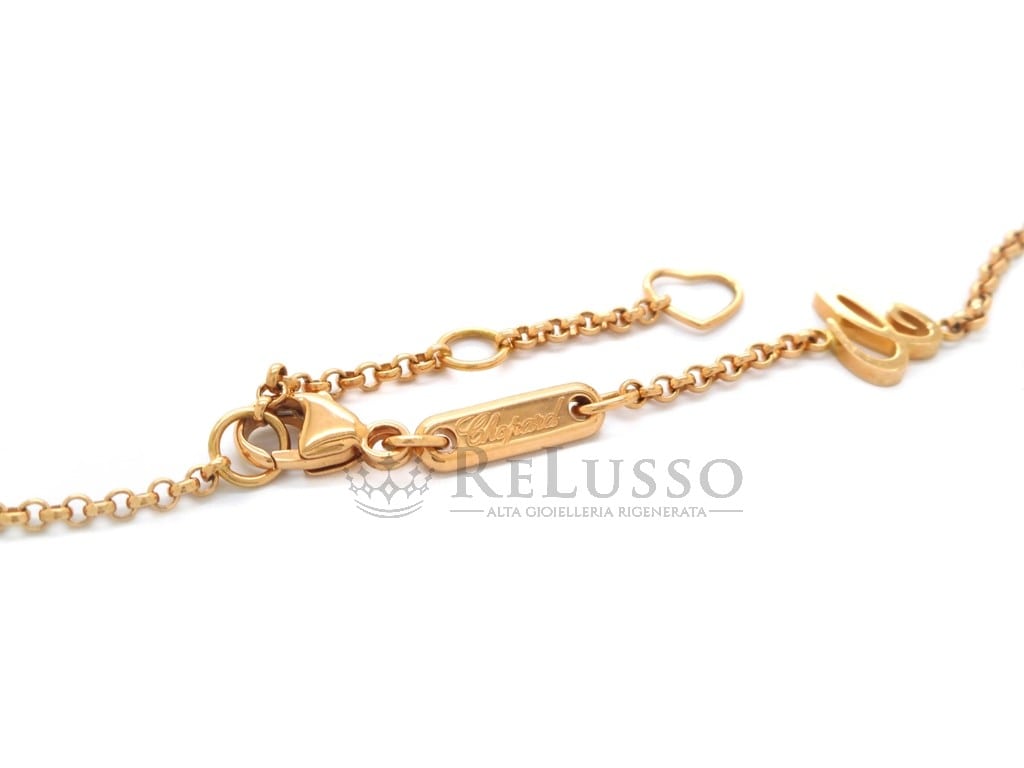 Collana con pendente Chopard collezione Happy Hearts in oro rosa, diamante e pietra rossa foto7
