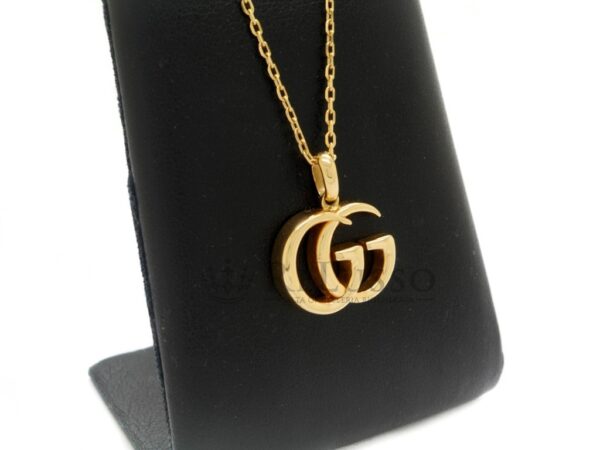 Collana Gucci GG Running in oro giallo. Pendente 17mm. foto13