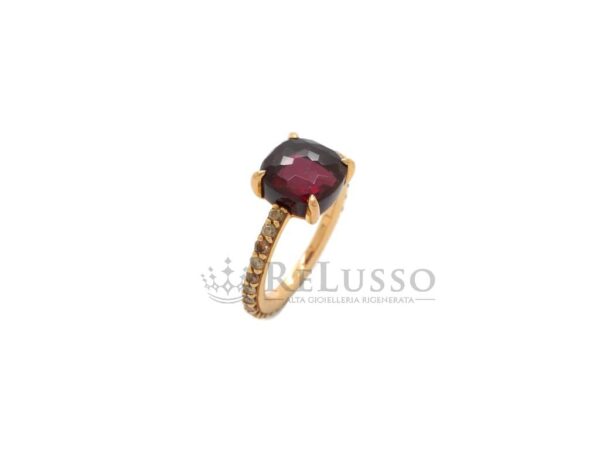 Anello Pomellato Baby in oro rosa, granato rodolite e diamanti brown. foto1