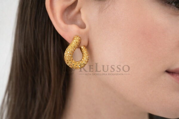 Orecchini Pomellato Onde in oro e zaffiri gialli foto22