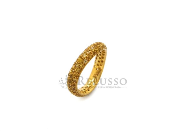 Anello Pomellato Onde in oro con pavé di zaffiri gialli. foto16