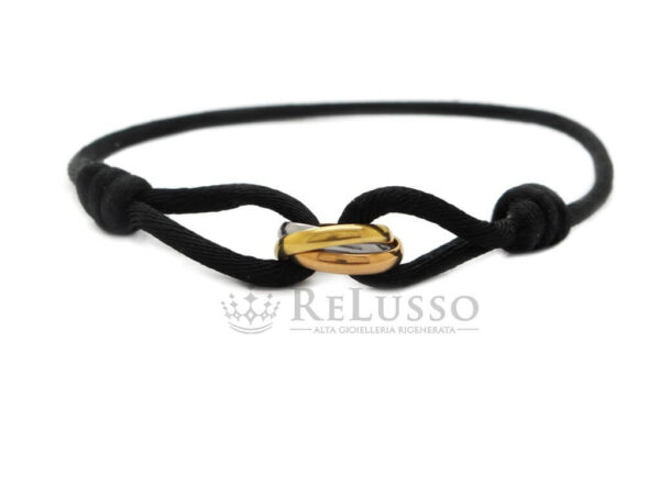 Bracciale Trinity de Cartier in oro 18kt con cordoncino. foto1